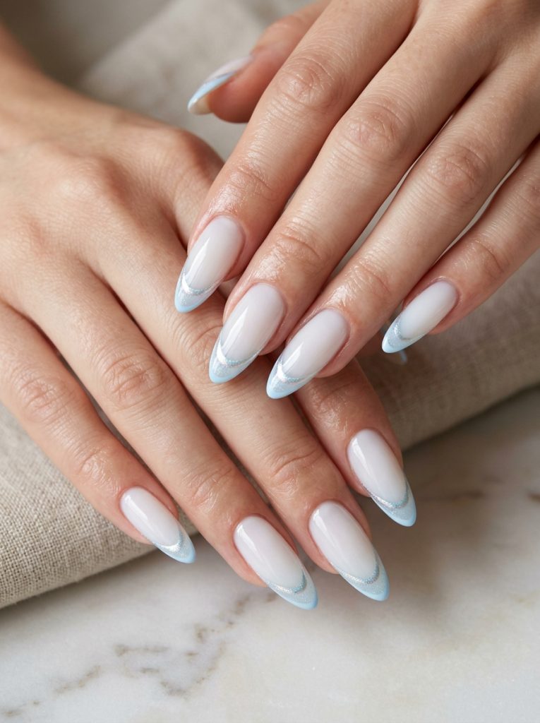 Classic French Tips With a Light Blue Twist-Fille vibe
