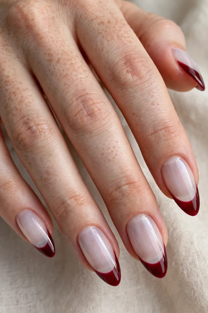 Ghostly white base nails with bloody french tip halloween nails design