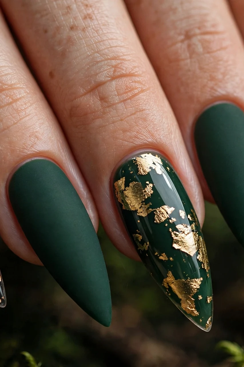 Forest green nails with gold foil flakes mixed with matte forest green nails